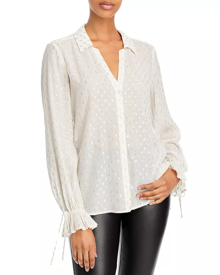 10.-white-shirt-with-details.webp